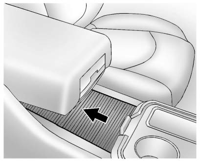 There is additional storage under the armrest. Move the armrest all the way to