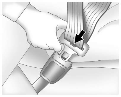 3. Push the latch plate into the buckle until it clicks.