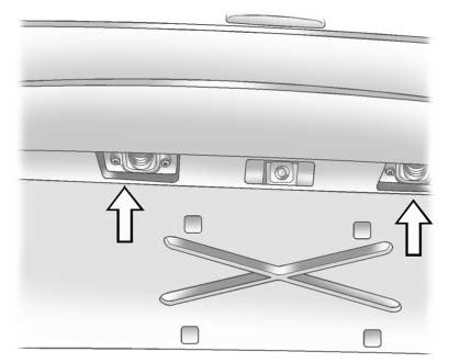 2. Turn and pull the license plate lamp forward through the liftgate trim opening.